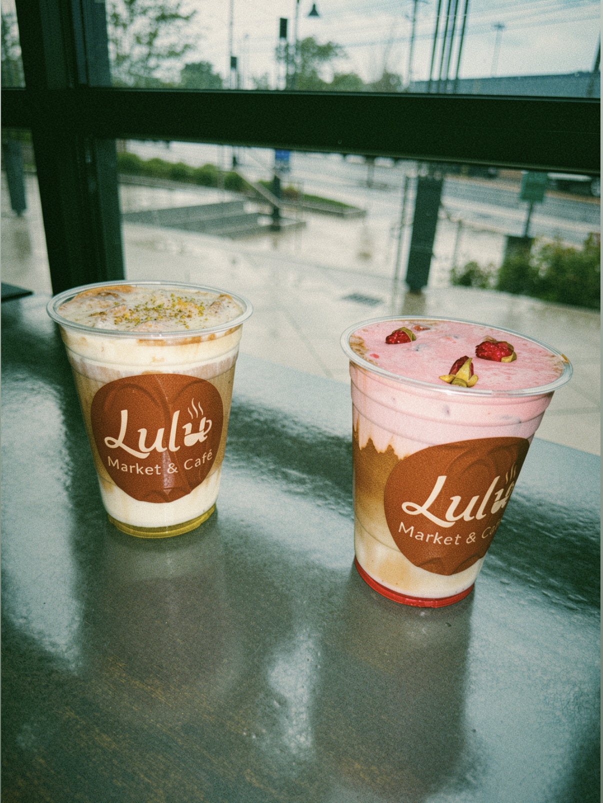 Pistachio and rose lattes side by side