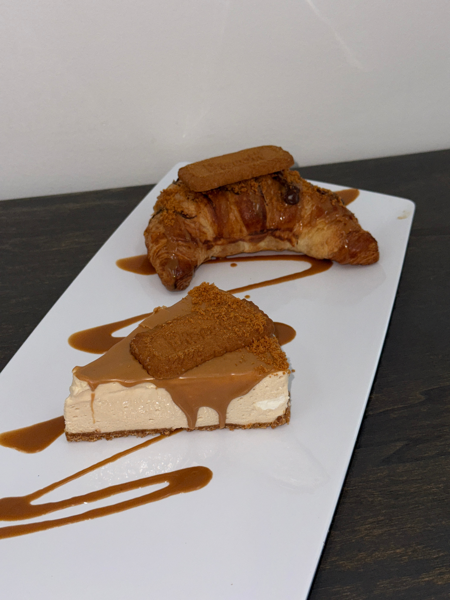 Biscoff cheesecake and Biscoff croissant on a platter